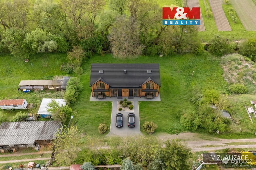 Prodej pozemku 1442 m², Dolín · Slaný