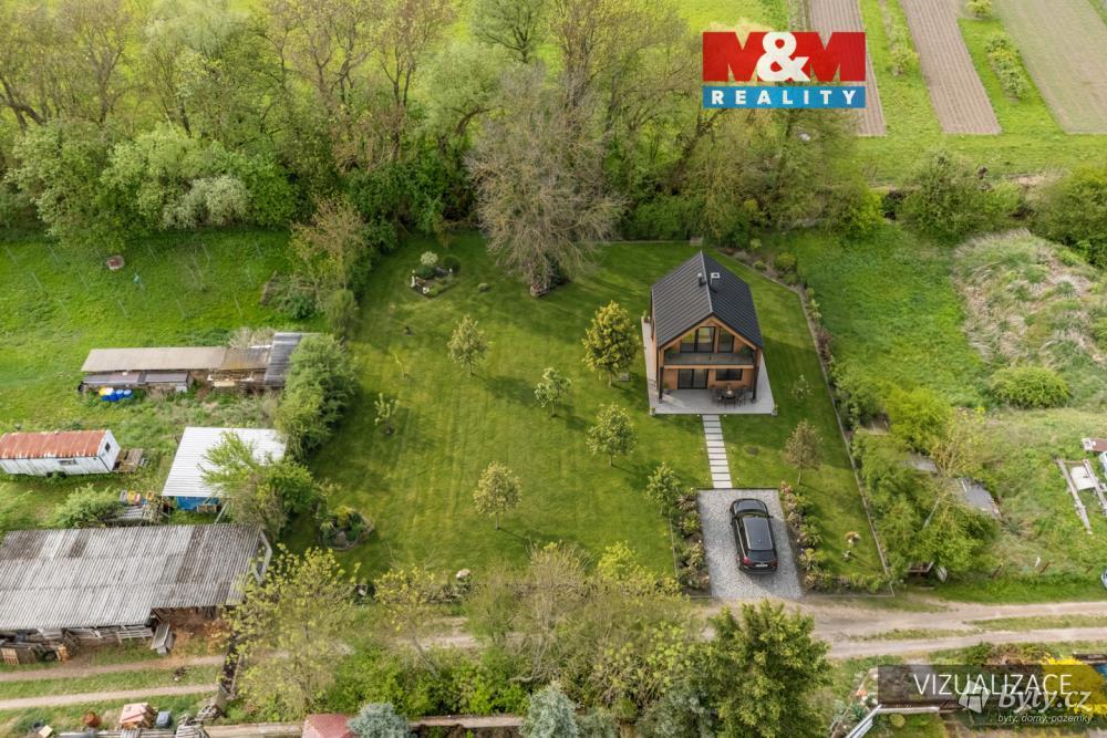 Prodej pozemku 709 m², Dolín · Slaný
