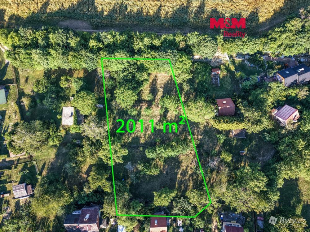 Prodej pozemku 2011 m², Dolany